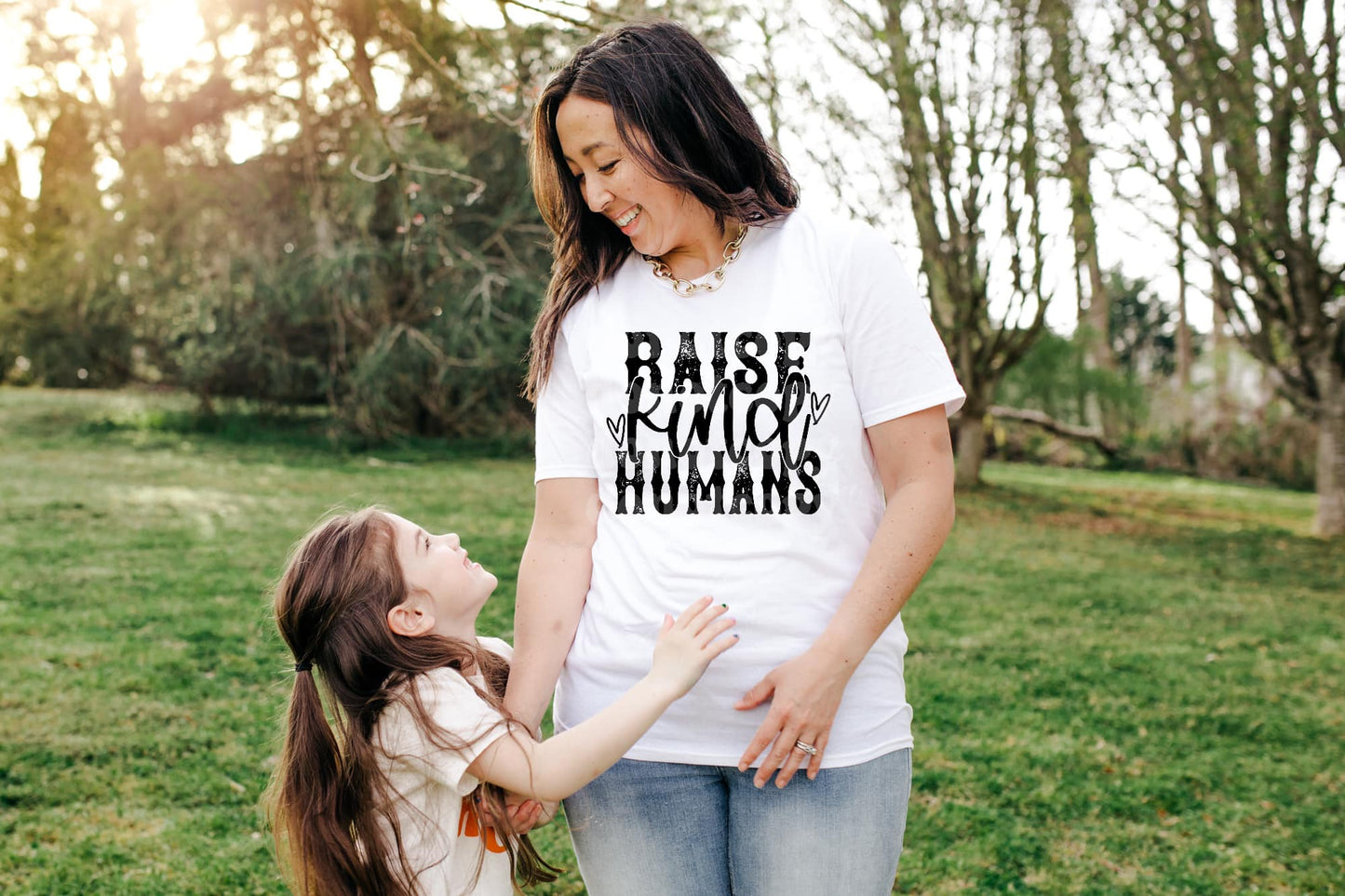 Raise kind humans  | T shirt